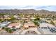 A residential neighborhood with mountain views and several backyard swimming pools at 3826 E Equestrian Trl, Phoenix, AZ 85044