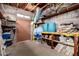 A basement with storage shelves and household equipment, showing potential for storage at 3826 E Equestrian Trl, Phoenix, AZ 85044