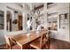 Bright dining room featuring beam details and unique decor at 3826 E Equestrian Trl, Phoenix, AZ 85044