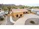 A single-Gathering home with a tile roof, desert landscaping, and a circular driveway at 3826 E Equestrian Trl, Phoenix, AZ 85044