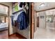 Walk-in closet featuring built in shelving at 3826 E Equestrian Trl, Phoenix, AZ 85044