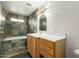 Bathroom features a bathtub with a tiled backsplash and a wood vanity with a white countertop at 4026 E Captain Dreyfus Ave, Phoenix, AZ 85032