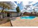 Large in-ground pool and spacious patio create a backyard oasis at 4026 E Captain Dreyfus Ave, Phoenix, AZ 85032