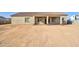 Back of house shows a covered patio and desert landscaping at 4130 N Del Monte Dr, Eloy, AZ 85131