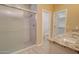 Bathroom featuring a walk-in shower with glass door and double sink vanity at 4130 N Del Monte Dr, Eloy, AZ 85131