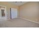 Neutral bedroom features carpet, closet, and ensuite bathroom at 4130 N Del Monte Dr, Eloy, AZ 85131