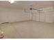 Clean, spacious garage with white walls and neutral painted floor at 4130 N Del Monte Dr, Eloy, AZ 85131