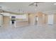 Modern kitchen with granite countertops, white cabinets, and stainless steel appliances at 4130 N Del Monte Dr, Eloy, AZ 85131