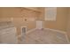 Functional laundry room with ample storage and granite counter space at 4130 N Del Monte Dr, Eloy, AZ 85131