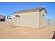 Exterior view of the property's detached storage shed with secure door at 4130 N Del Monte Dr, Eloy, AZ 85131