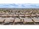 Panoramic aerial view of a residential neighborhood with similar single-Gathering homes at 42368 W North Star Dr, Maricopa, AZ 85138