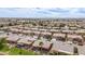 A high-angle view of a large neighborhood featuring well-maintained homes and landscaping at 42368 W North Star Dr, Maricopa, AZ 85138