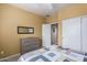 Bedroom featuring a dresser, closet and stylish decor for a relaxing retreat at 42368 W North Star Dr, Maricopa, AZ 85138