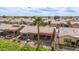 Aerial view of back of home showing the outdoor patio and manicured desert landscaping at 42368 W North Star Dr, Maricopa, AZ 85138