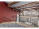 View of second story hallway with wood beams and railing with decorative wrought iron at 42368 W North Star Dr, Maricopa, AZ 85138