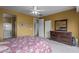 Spacious main bedroom featuring a dresser and neutral carpet at 42368 W North Star Dr, Maricopa, AZ 85138