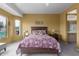 Main bedroom with carpet, ceiling fan, and a window to let in sunlight at 42368 W North Star Dr, Maricopa, AZ 85138