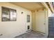 Covered patio with neutral walls, window, door to exterior and door to storage closet at 455 S Mesa Dr # 126, Mesa, AZ 85210