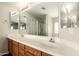 Bathroom boasts a large double sink vanity, a large mirror, and natural light at 4675 E Olney Ave, Gilbert, AZ 85234