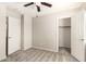 Bright bedroom with closet and fan at 4675 E Olney Ave, Gilbert, AZ 85234