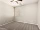 Neutral bedroom with gray carpet and window at 4675 E Olney Ave, Gilbert, AZ 85234