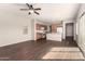 Spacious living room boasts modern ceiling fan and flows into the open-concept kitchen at 4675 E Olney Ave, Gilbert, AZ 85234