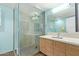 Stylish bathroom featuring a glass-enclosed shower and a modern vanity at 535 W Thomas Rd # 313, Phoenix, AZ 85013