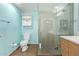 Well-appointed bathroom with a glass shower, toilet, and modern fixtures at 535 W Thomas Rd # 313, Phoenix, AZ 85013