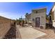 Private backyard patio area for outdoor dining and relaxation with stone accents at 632 Aero Rd, Mesa, AZ 85205