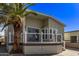 Attractive home featuring a welcoming porch, neutral siding, decorative windows and mature landscaping at 632 Aero Rd, Mesa, AZ 85205