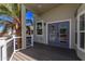 Welcoming front porch featuring stylish railings, desert landscaping, and a colorful entrance door at 632 Aero Rd, Mesa, AZ 85205