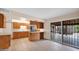 Bright kitchen with stainless steel appliances and wood cabinets at 6405 N 46Th Dr, Glendale, AZ 85301