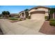 Well-maintained single Gathering house with a two car garage and manicured front yard at 6494 W Matilda Ln, Glendale, AZ 85308