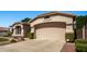 Well-maintained single Gathering house with a two car garage and manicured front yard at 6494 W Matilda Ln, Glendale, AZ 85308