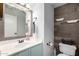 Stylish bathroom with decorative wall and modern fixtures at 7371 W Louise Dr, Glendale, AZ 85310