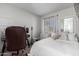 Bedroom with desk and great natural light at 7371 W Louise Dr, Glendale, AZ 85310