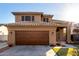 Beautiful two-story home featuring an attached two car garage and tiled roof at 7371 W Louise Dr, Glendale, AZ 85310