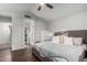 Spacious main bedroom with vaulted ceilings and wood floors at 7371 W Louise Dr, Glendale, AZ 85310