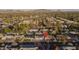 Aerial view of property in residential neighborhood with view of mountains in the distance at 7819 N 17Th Ave, Phoenix, AZ 85021