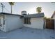 Exterior of the home showing off the yard, window, patio, and HVAC unit at 7819 N 17Th Ave, Phoenix, AZ 85021