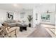 Bright living room featuring a neutral palette, modern decor, and ample natural light at 7819 N 17Th Ave, Phoenix, AZ 85021