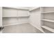 Walk-in closet with shelving and rods for ample storage space at 7854 W Mockingbird Way, Florence, AZ 85132