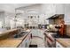 Kitchen featuring stainless steel appliances, granite countertops, and white cabinetry at 7866 W Taro Ln, Glendale, AZ 85308