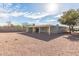 Spacious backyard with gravel and a covered patio, perfect for outdoor activities at 800 W 12Th St, Tempe, AZ 85281