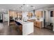 Stylish kitchen with an island, stainless steel appliances, pendant lighting, and white subway tile backsplash at 8740 W San Miguel Ave, Glendale, AZ 85305