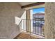 View from a balcony with an iron railing looking towards the neighborhood and sky at 8840 S 51St St # 2, Phoenix, AZ 85044