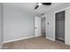 Bedroom featuring a closet and an open door leading to another room at 9127 E Broadway Rd, Mesa, AZ 85208