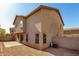 Two-story home exterior featuring desert landscaping and rear patio at 9643 N 81St Dr, Peoria, AZ 85345