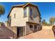 Home featuring an exterior courtyard and stucco at 9643 N 81St Dr, Peoria, AZ 85345