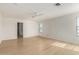 Empty primary bedroom with neutral tones, lots of light and light wood floors at 9643 N 81St Dr, Peoria, AZ 85345